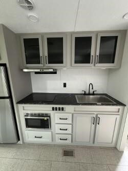 Kitchen View of 2026 RECREATION BY DESIGN GRAND TRAVEL HC34FB